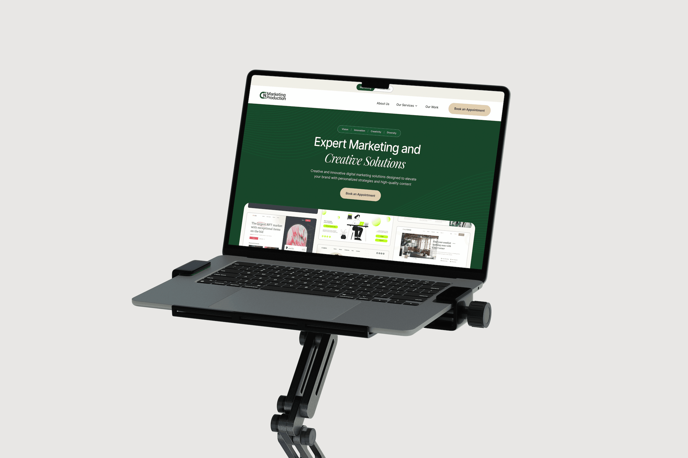 The redesigned MarketingNProduction homepage on a laptop