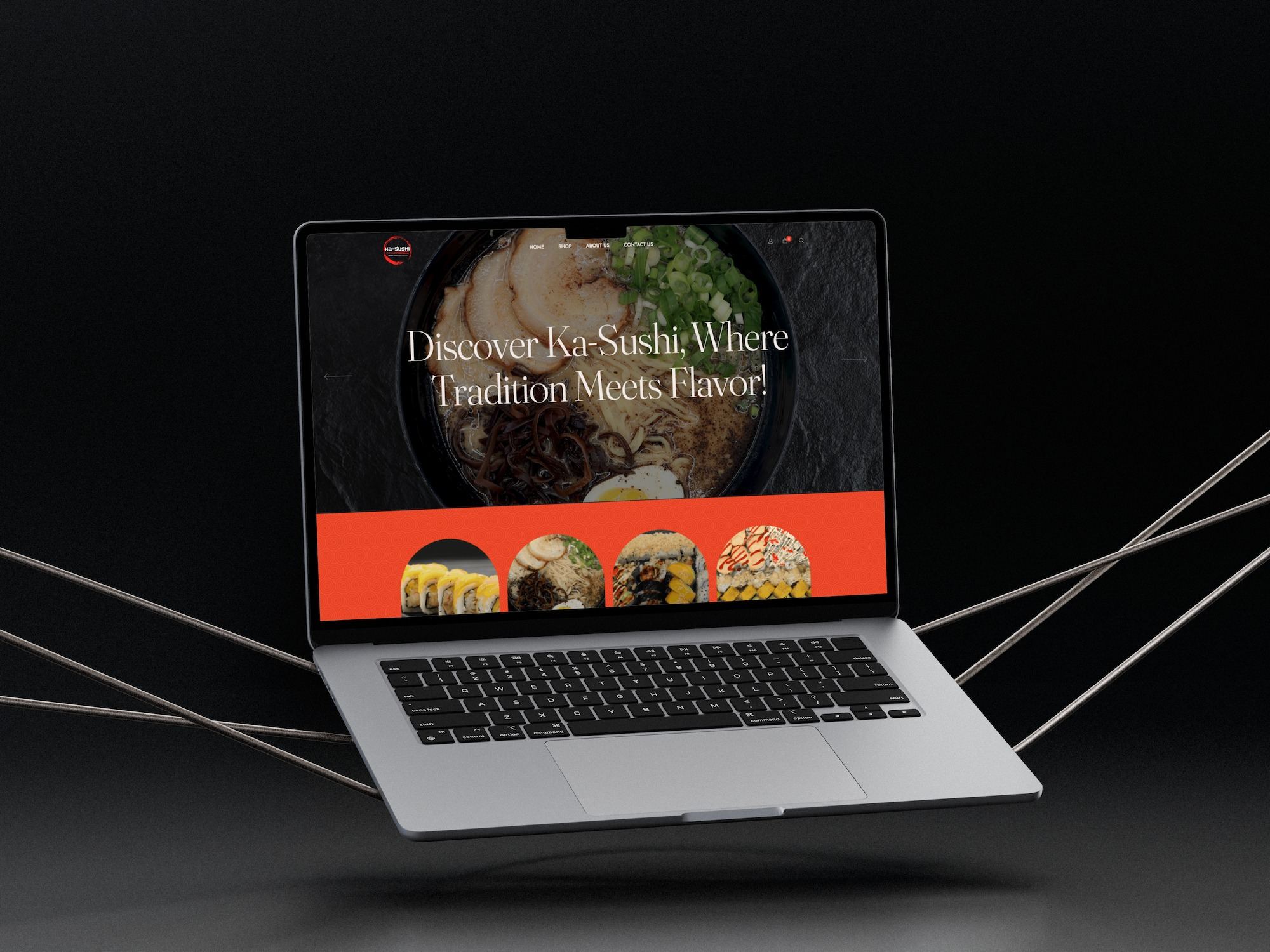 The Ka-Sushi homepage on a MacBook floating above a dark floor, resting on long metal chopsticks